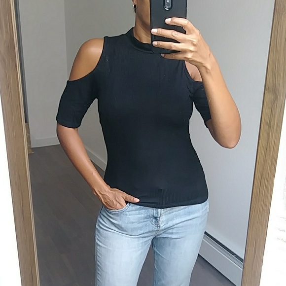 black shoulderless top